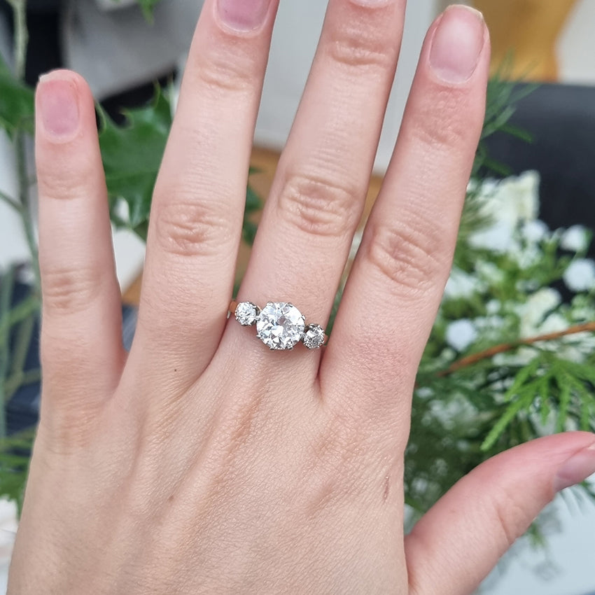 Art Deco French 1.81ct Old Cut Diamond Three Stone Engagement Ring, central 1.81ct F/G VS1 diamond flanked by smaller diamonds in platinum to 18ct yellow gold band
