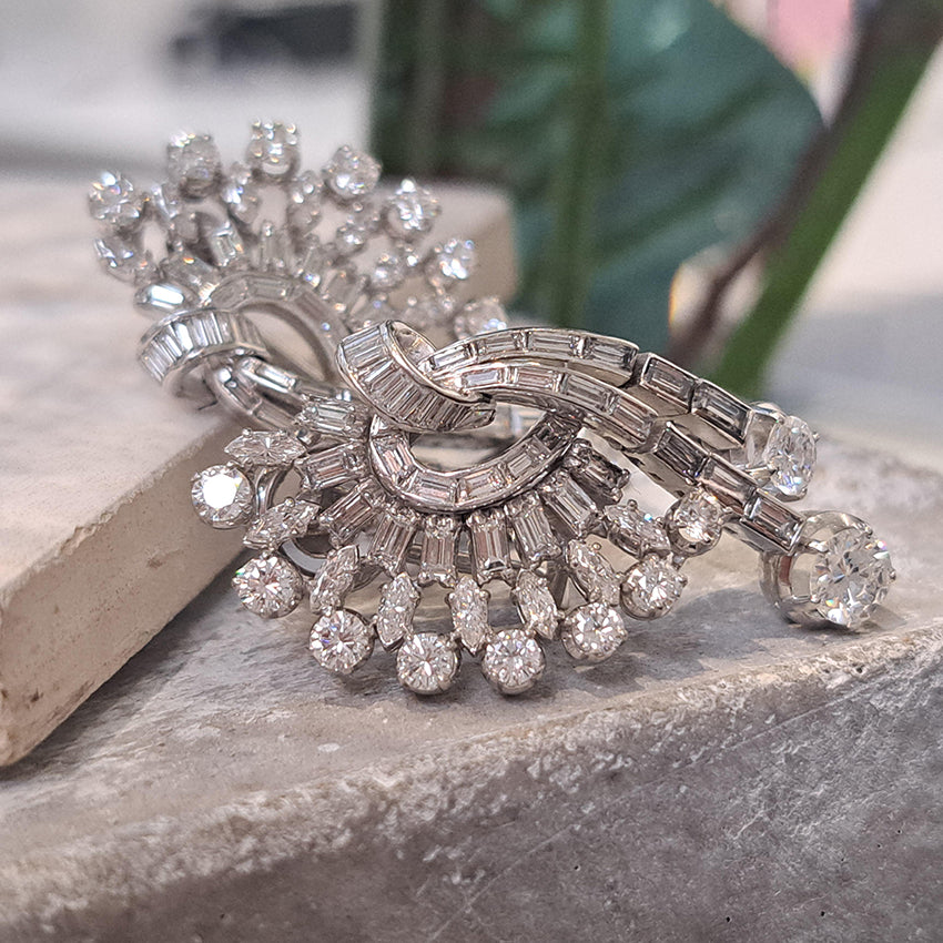 Carl Bucherer Vintage Diamond Spray Earrings in Platinum, set with sparkling brilliant, baguette and marquise-cut diamonds with post and clip fittings. Circa 1950s