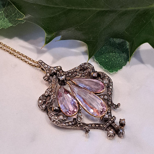 Antique Pink Topaz and Diamond Pendant Necklace, three teardrop pear shaped pink topaz within rose-cut diamond set surround in silver upon 18ct gold
