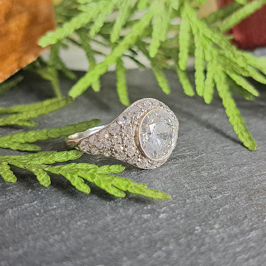 Art Deco 2.8ct Diamond Bombe Cluster Ring, 2.8ct old European transitional cut diamond in single-cut diamond encrusted domed surround in platinum