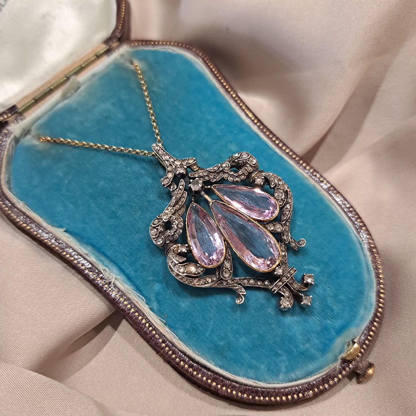 Antique Pink Topaz and Diamond Pendant Necklace, three teardrop pear shaped pink topaz within rose-cut diamond set surround in silver upon 18ct gold