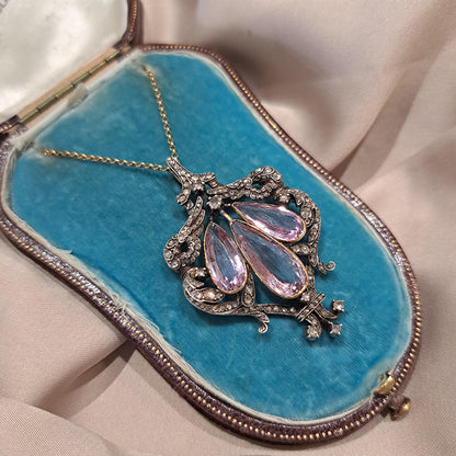 Antique Pink Topaz and Diamond Pendant Necklace, three teardrop pear shaped pink topaz within rose-cut diamond set surround in silver upon 18ct gold