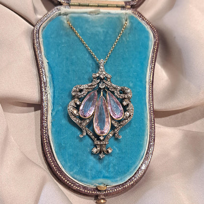 Antique Pink Topaz and Diamond Pendant Necklace, three teardrop pear shaped pink topaz within rose-cut diamond set surround in silver upon 18ct gold