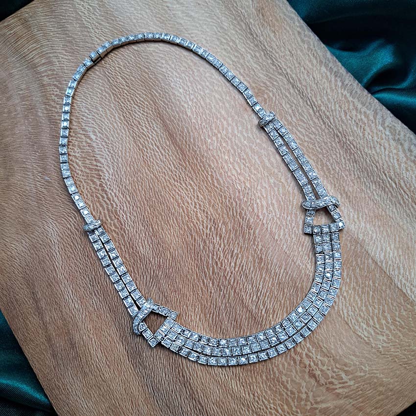 Antique Art Deco 7.64ct Diamond Collar Necklace in Platinum, single-cut and eight-cut diamonds in individual square articulated settings with central three row section graduated to a two row and single row of diamonds with geometric buckle shaped link sections