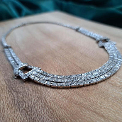 Antique Art Deco 7.64ct Diamond Collar Necklace in Platinum, single-cut and eight-cut diamonds in individual square articulated settings with central three row section graduated to a two row and single row of diamonds with geometric buckle shaped link sections