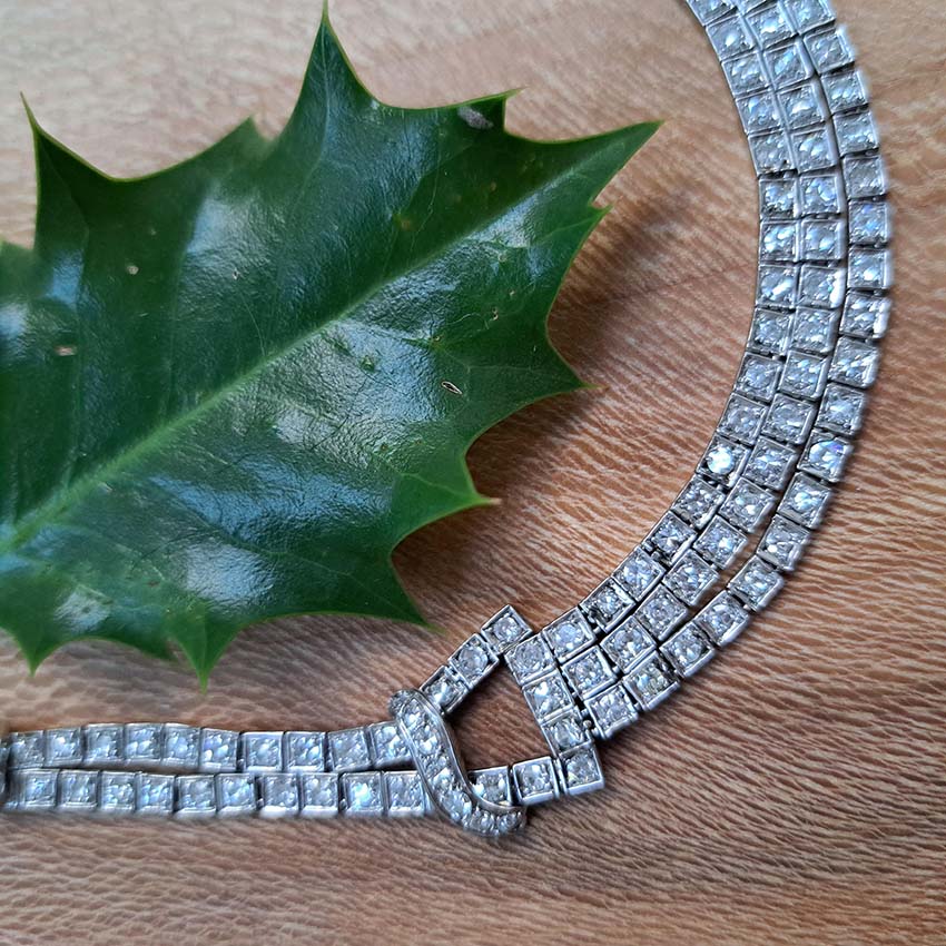 Antique Art Deco 7.64ct Diamond Collar Necklace in Platinum, single-cut and eight-cut diamonds in individual square articulated settings with central three row section graduated to a two row and single row of diamonds with geometric buckle shaped link sections