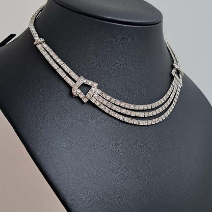 Antique Art Deco 7.64ct Diamond Collar Necklace in Platinum, single-cut and eight-cut diamonds in individual square articulated settings with central three row section graduated to a two row and single row of diamonds with geometric buckle shaped link sections