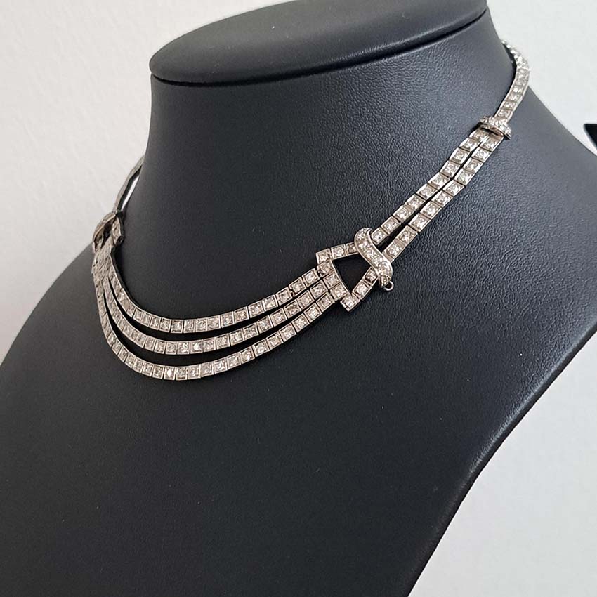 Antique Art Deco 7.64ct Diamond Collar Necklace in Platinum, single-cut and eight-cut diamonds in individual square articulated settings with central three row section graduated to a two row and single row of diamonds with geometric buckle shaped link sections