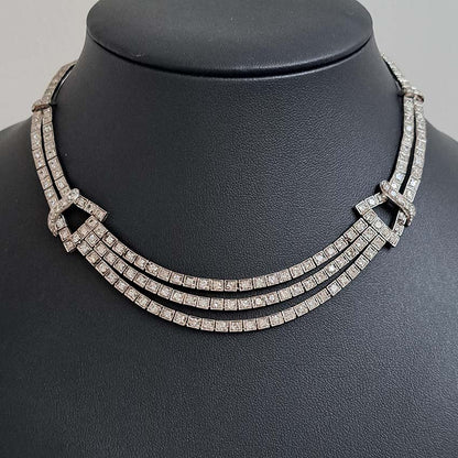 Antique Art Deco 7.64ct Diamond Collar Necklace in Platinum, single-cut and eight-cut diamonds in individual square articulated settings with central three row section graduated to a two row and single row of diamonds with geometric buckle shaped link sections