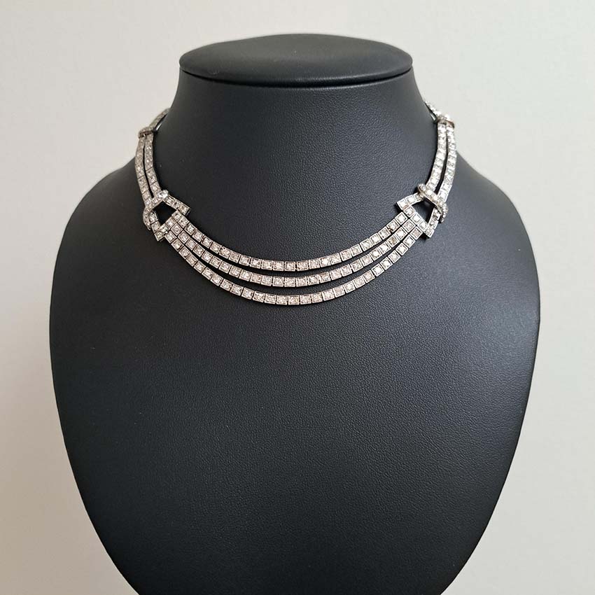 Antique Art Deco 7.64ct Diamond Collar Necklace in Platinum, single-cut and eight-cut diamonds in individual square articulated settings with central three row section graduated to a two row and single row of diamonds with geometric buckle shaped link sections