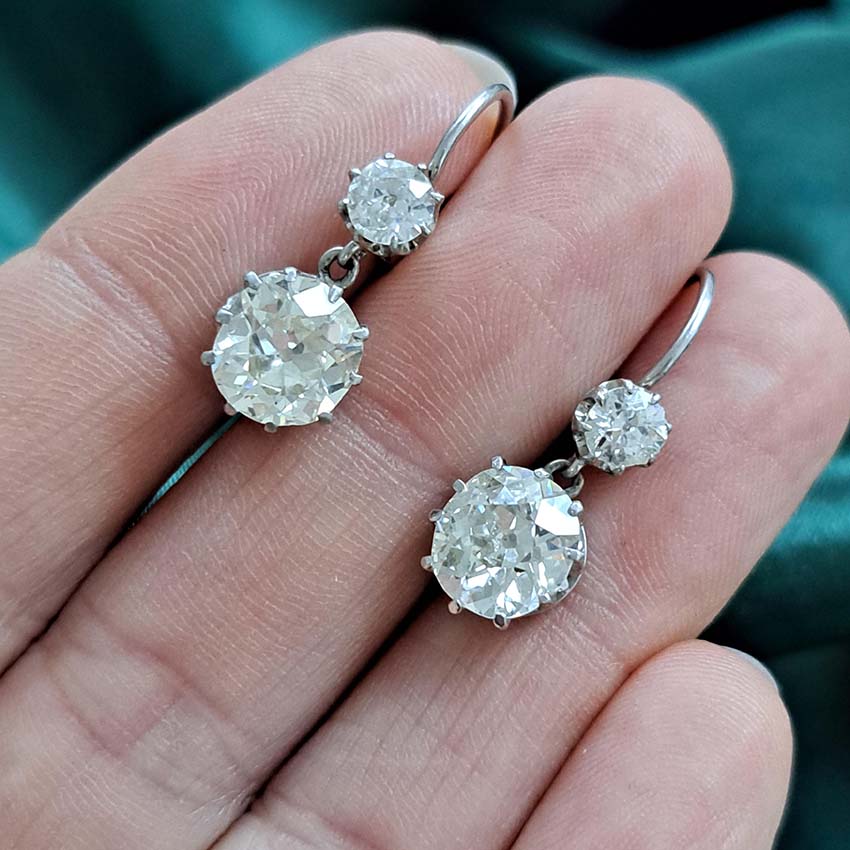 Antique 4.5ct Old Mine Cut Diamond Drop Earrings, sparkling old mine-cut diamond drops suspended from smaller old-cut diamond tops in platinum and 18ct gold