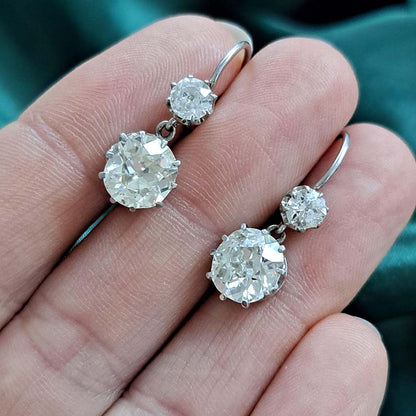 Antique 4.5ct Old Mine Cut Diamond Drop Earrings, sparkling old mine-cut diamond drops suspended from smaller old-cut diamond tops in platinum and 18ct gold