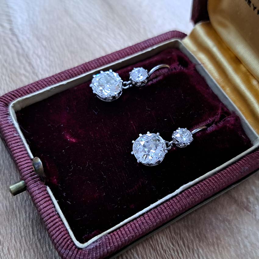 Antique 4.5ct Old Mine Cut Diamond Drop Earrings, sparkling old mine-cut diamond drops suspended from smaller old-cut diamond tops in platinum and 18ct gold