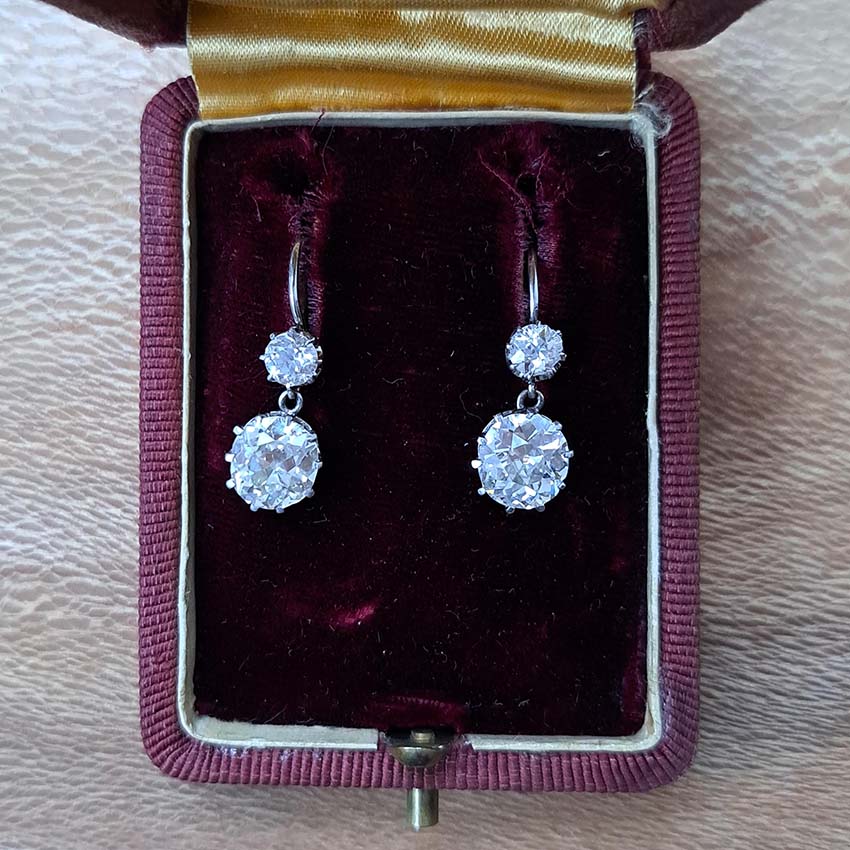 Antique 4.5ct Old Mine Cut Diamond Drop Earrings, sparkling old mine-cut diamond drops suspended from smaller old-cut diamond tops in platinum and 18ct gold