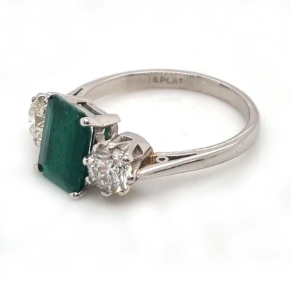 Emerald Cut Emerald and Diamond Three Stone Ring in 18ct White Gold