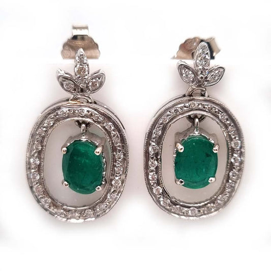 Vintage 1.7ct Emerald and Diamond Oval Cluster Drop Earrings, 7.14ct oval emerald pendant drops within fixed oval diamond-set halo surrounds from diamond fleur-de-lis tops in 18ct white gold