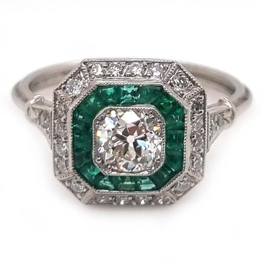 Old Cut Diamond and Emerald Target Cluster Engagement Ring, 0.55ct old cut diamond surrounded by calibre emeralds and an outer row of diamonds in platinum