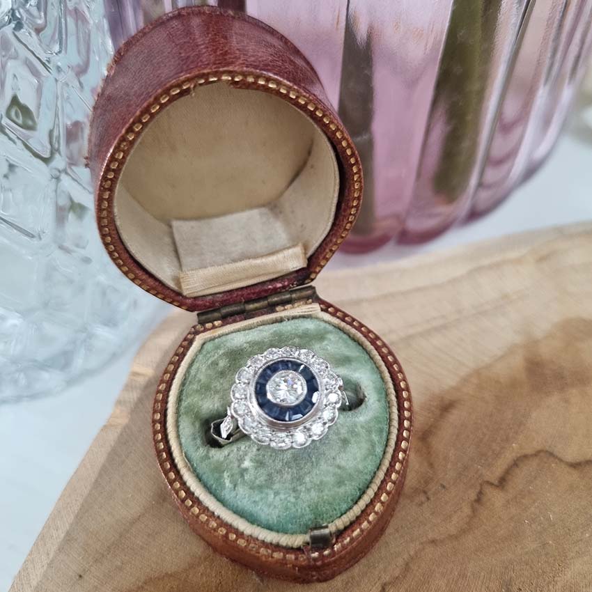 Diamond and Sapphire Target Cluster Engagement Ring