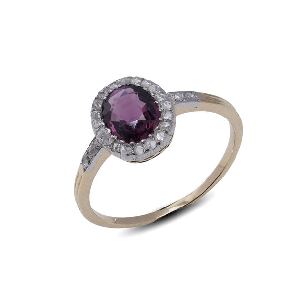 Spinel and diamond cluster ring in gold and platinum.