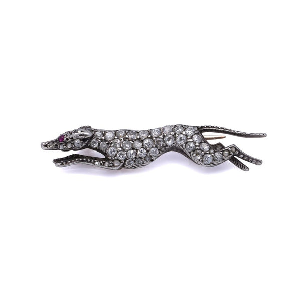 Antique gold and silver greyhound brooch with diamonds and ruby.
