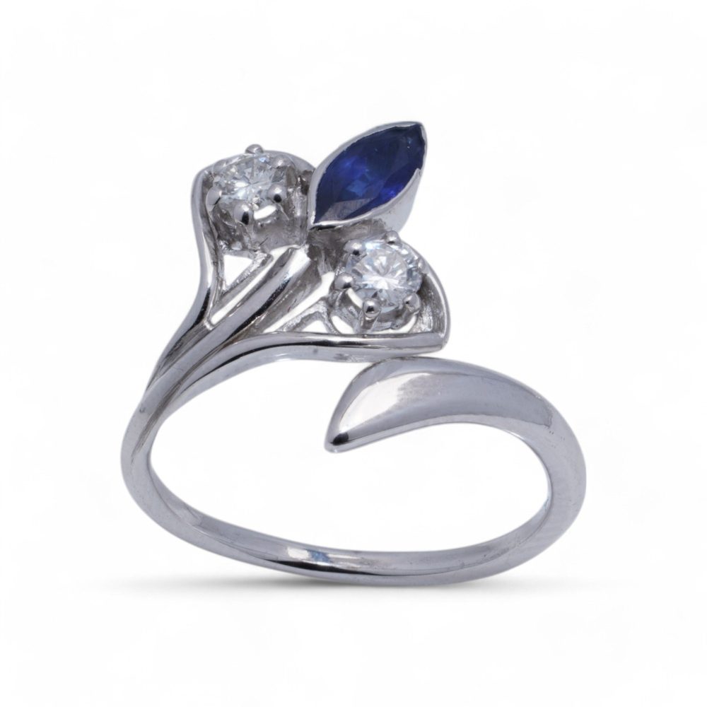 Sapphire And Diamond Flower Ring In 18 Carat White Gold