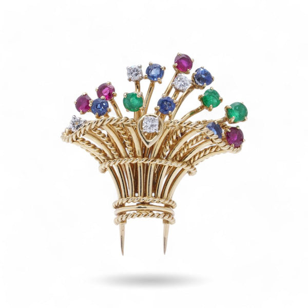 Cartier vintage flower basket brooch with gemstones in gold.