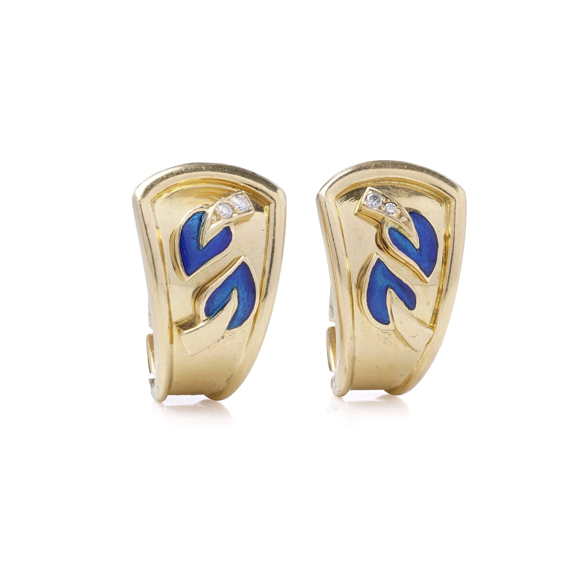 A pair of yellow gold earrings with blue enamel leaves and round diamonds, on a white background