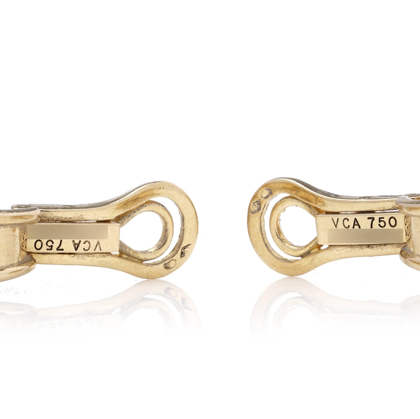 A pair of yellow gold earring clips stamped VCA 750