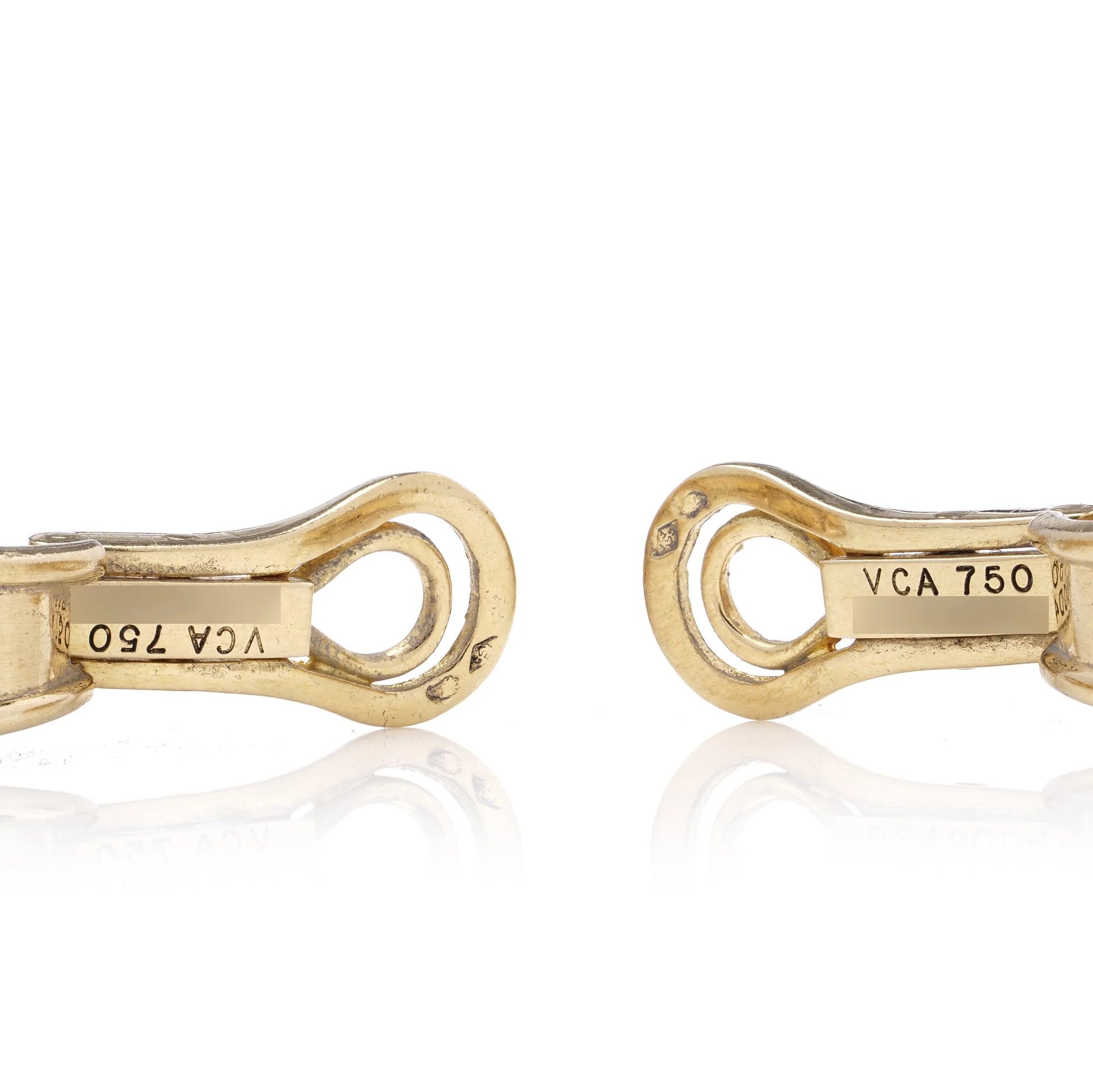 A pair of yellow gold earring clips stamped VCA 750