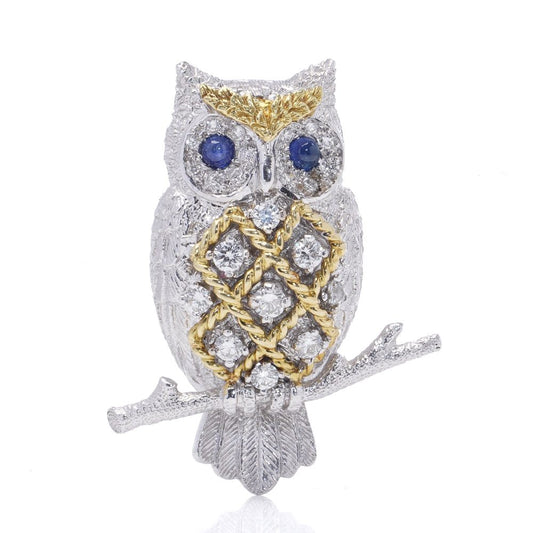 Sapphire and Diamond owl brooch with sapphire eyes in white and yellow gold. on branch