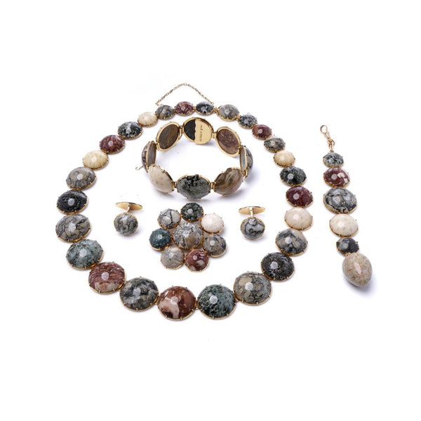 Swedish jewellery set with gemstones in gold.