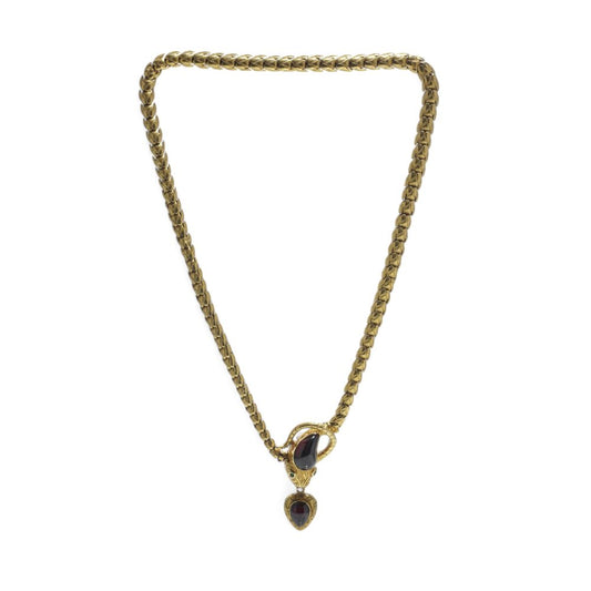Victorian snake necklace with garnets and emeralds in gold.