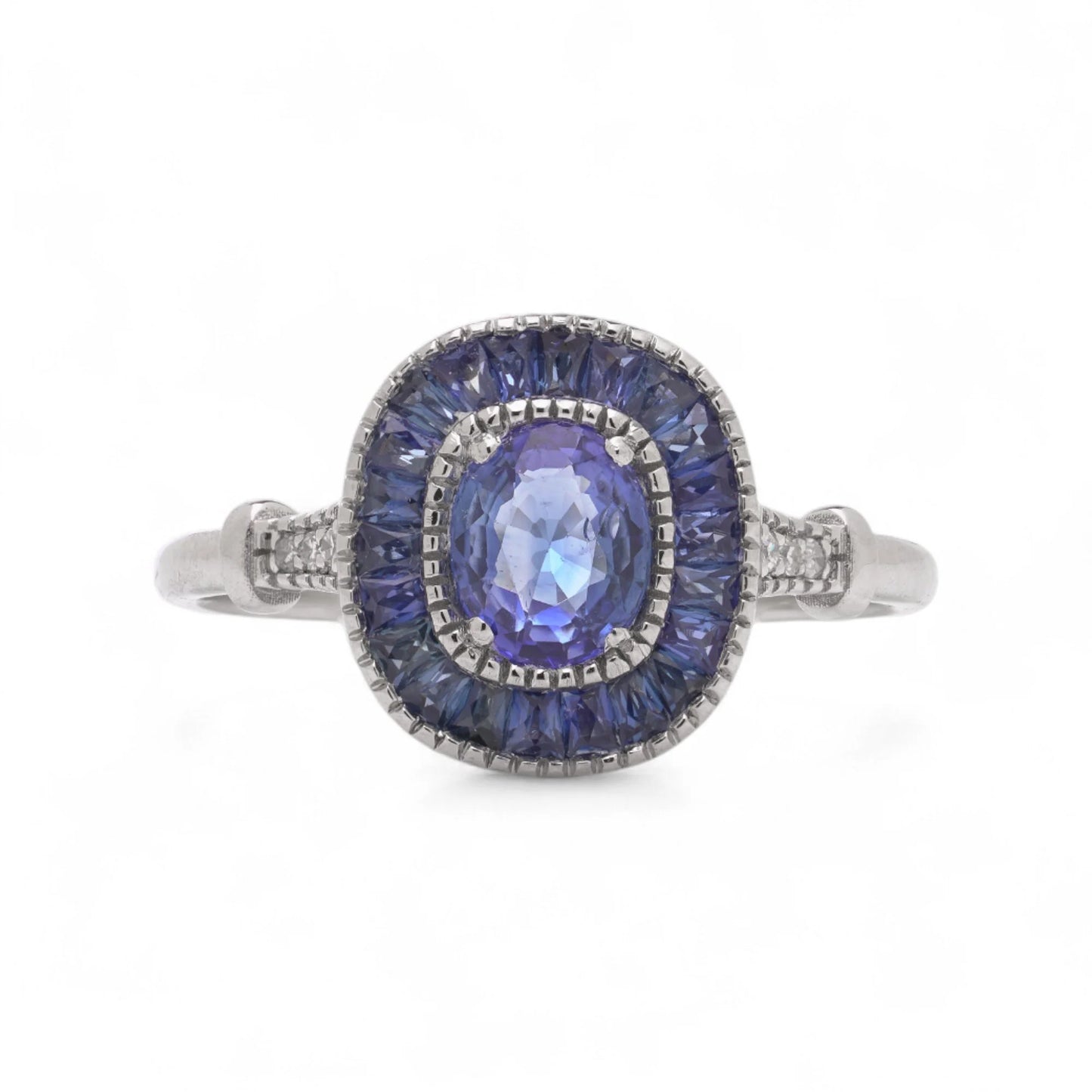 Sapphire Cluster Engagement Ring in Platinum with Diamonds
