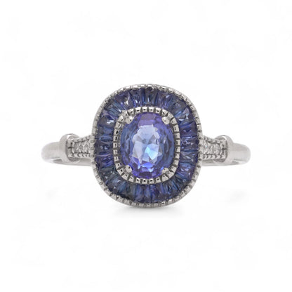 Sapphire Cluster Engagement Ring in Platinum with Diamonds