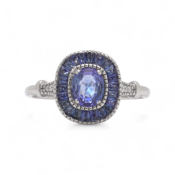 Sapphire Cluster Engagement Ring in Platinum with Diamonds