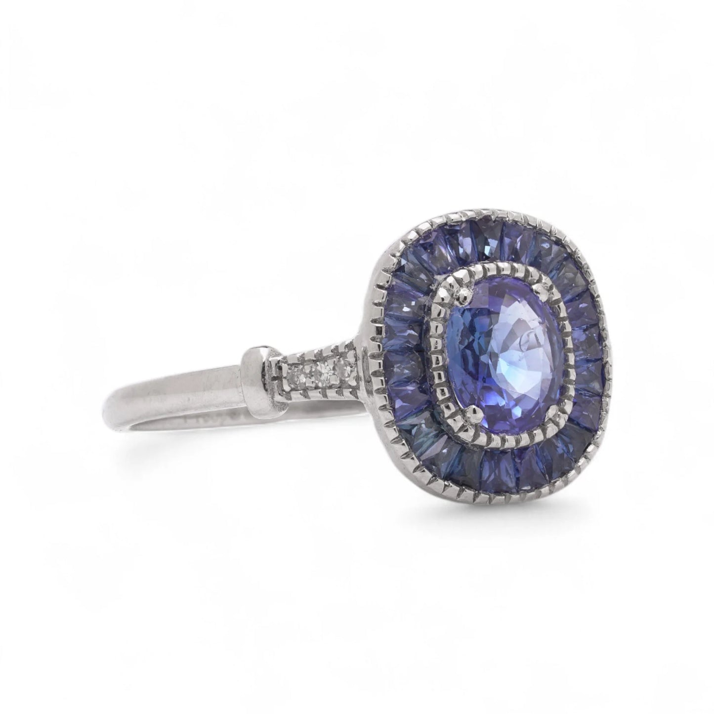 Sapphire Cluster Engagement Ring in Platinum with Diamonds