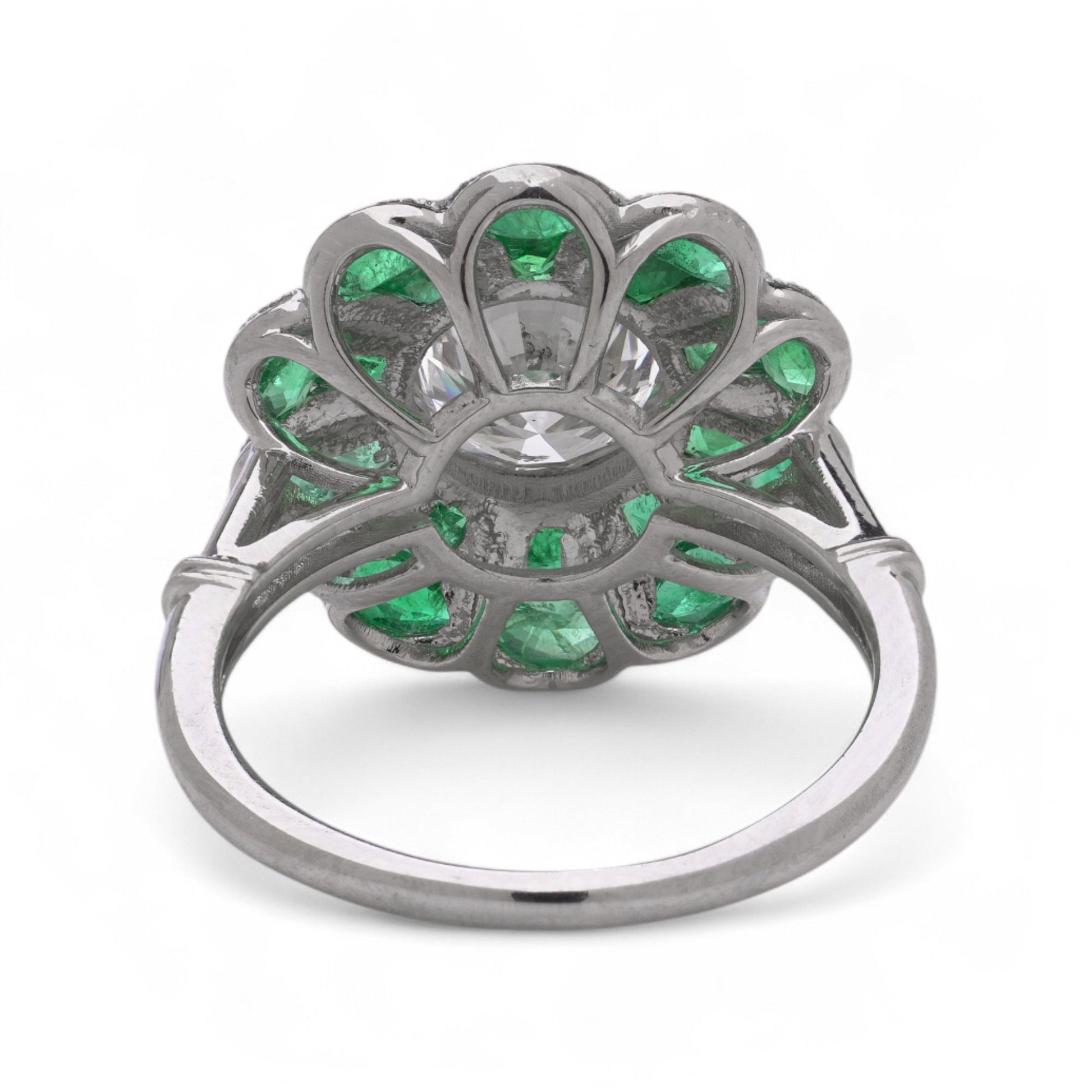 Contemporary Diamond and Emerald Flower Cluster Engagement Ring in Platinum