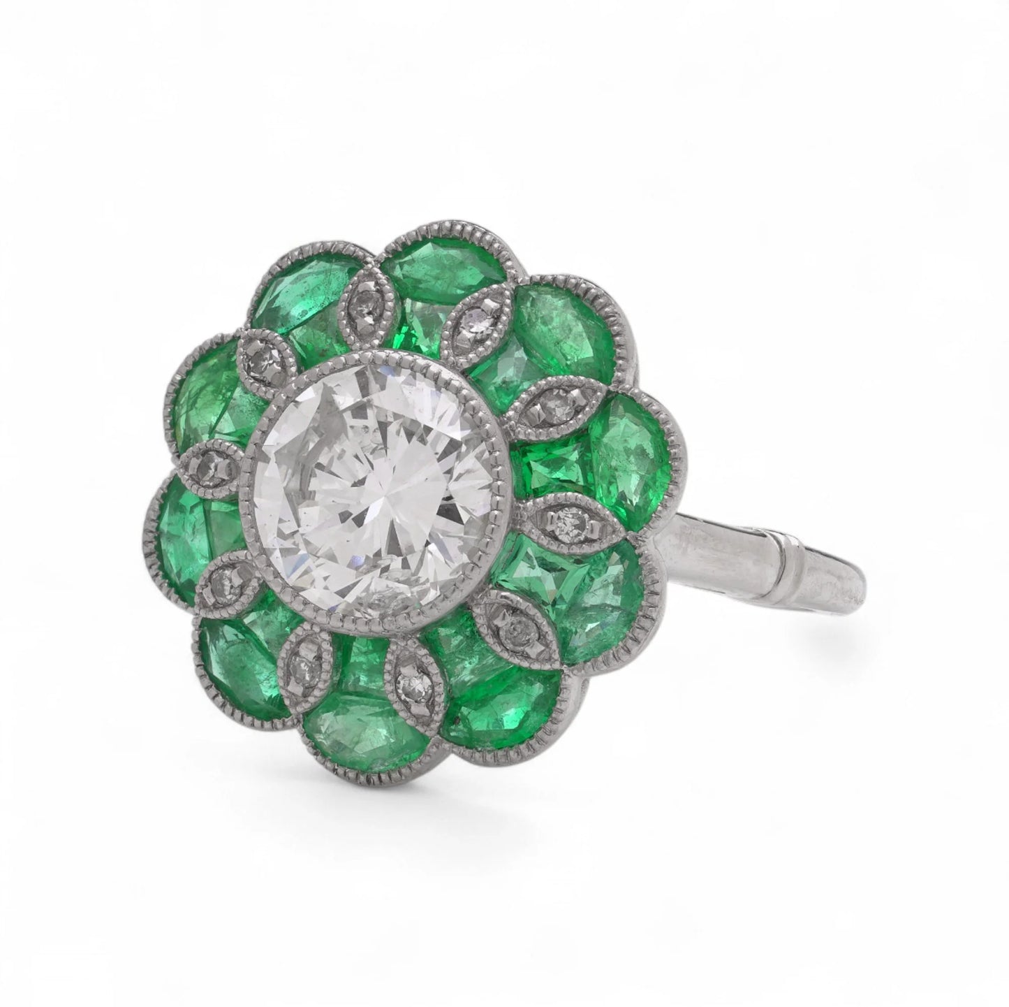 Contemporary Diamond and Emerald Flower Cluster Engagement Ring in Platinum