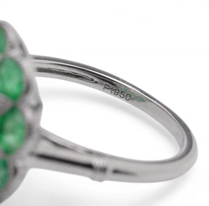 Contemporary Diamond and Emerald Flower Cluster Engagement Ring in Platinum