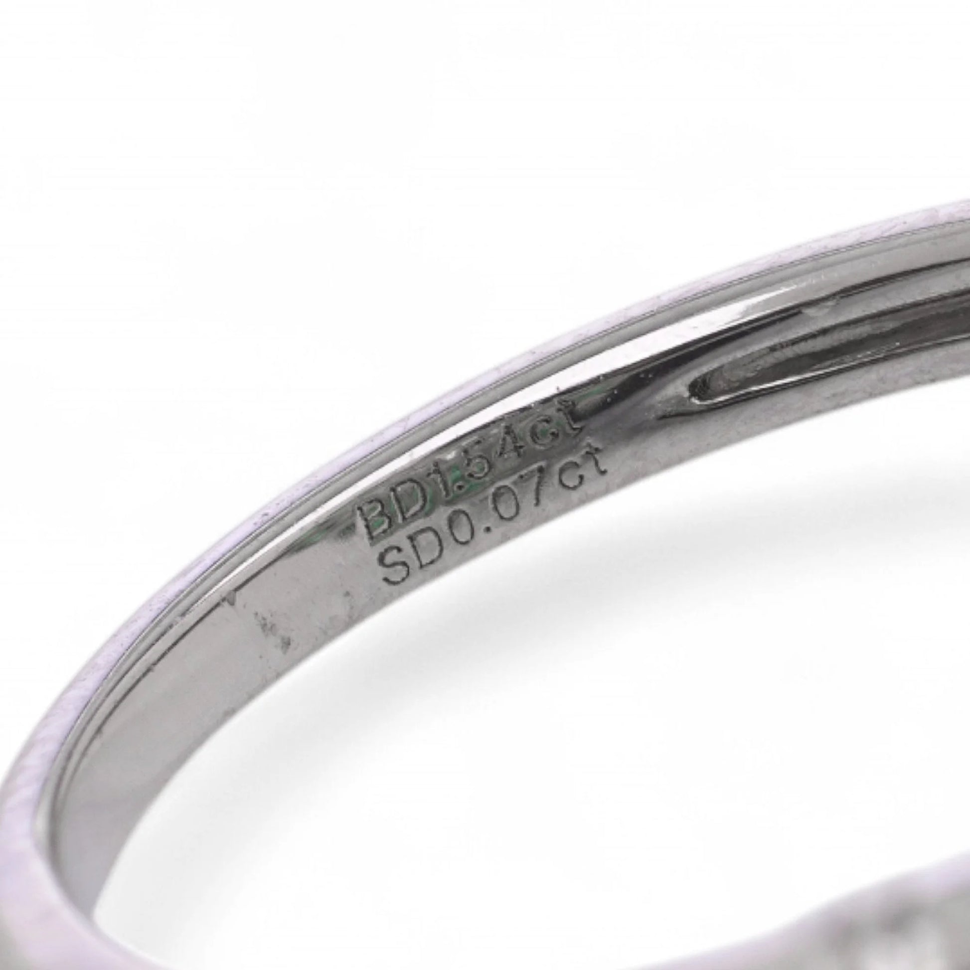 Contemporary Diamond and Emerald Flower Cluster Engagement Ring in Platinum