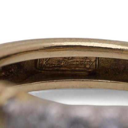 Kutchinsky diamond band ring crafted in 18kt yellow gold.