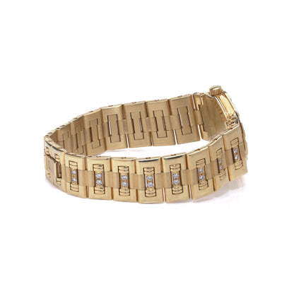 A ladies Piaget yellow gold and diamond wristwatch, on a white background