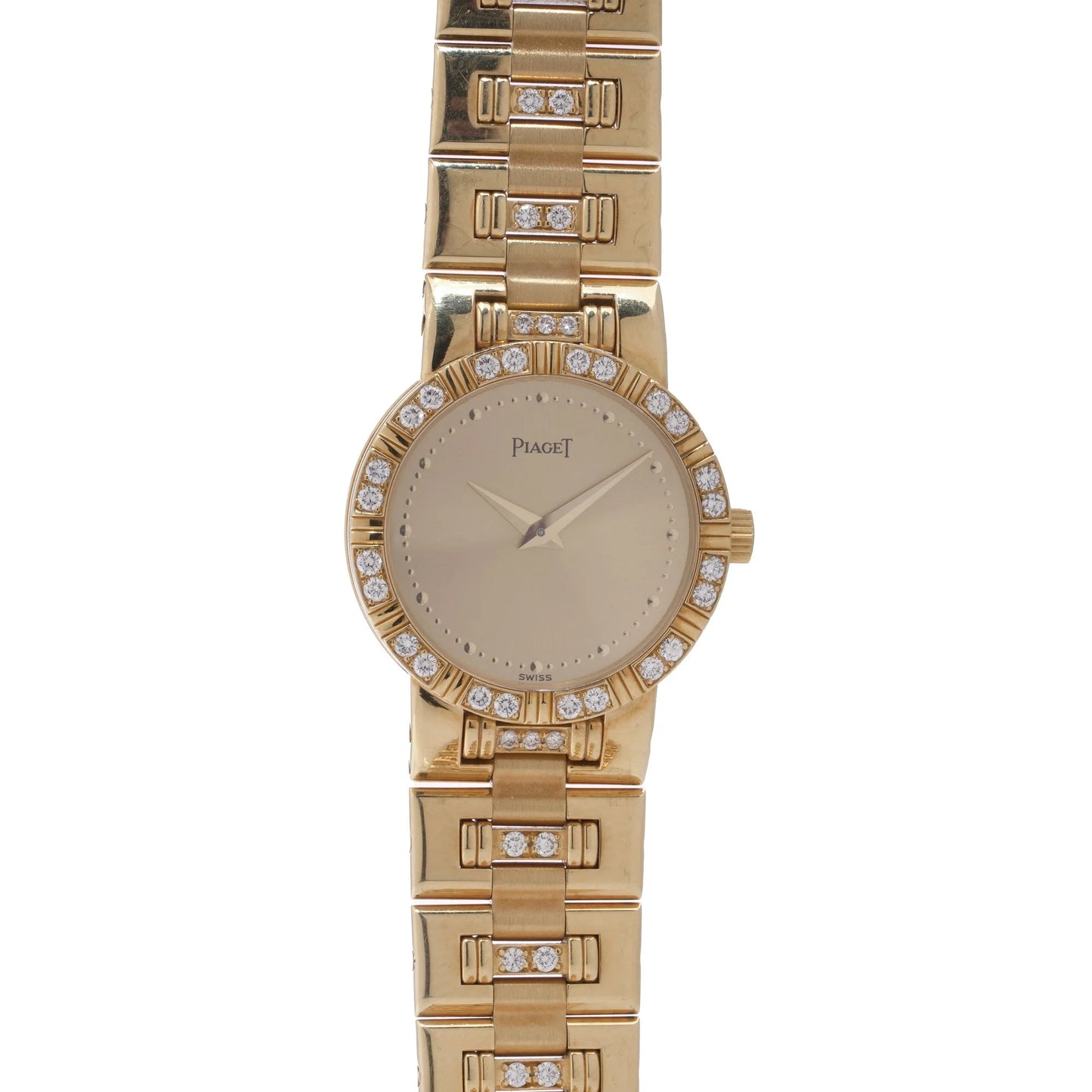 A ladies Piaget yellow gold and diamond wristwatch with champagne coloured dial, on a white background