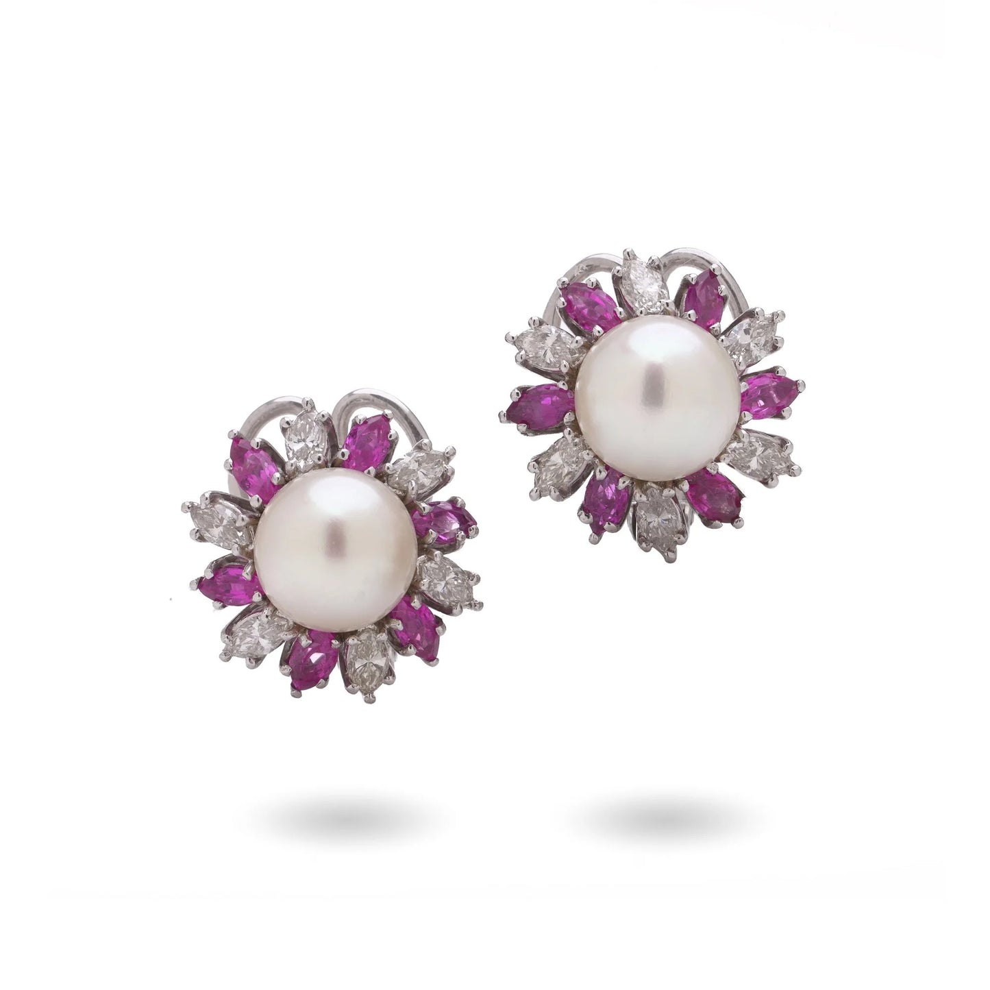 A pair of pearl, pink sapphire and diamond cluster earrings, on a white background