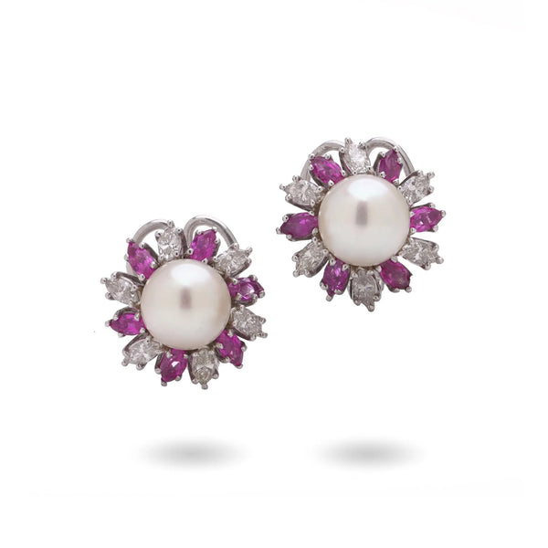 A pair of pearl, pink sapphire and diamond cluster earrings, on a white background