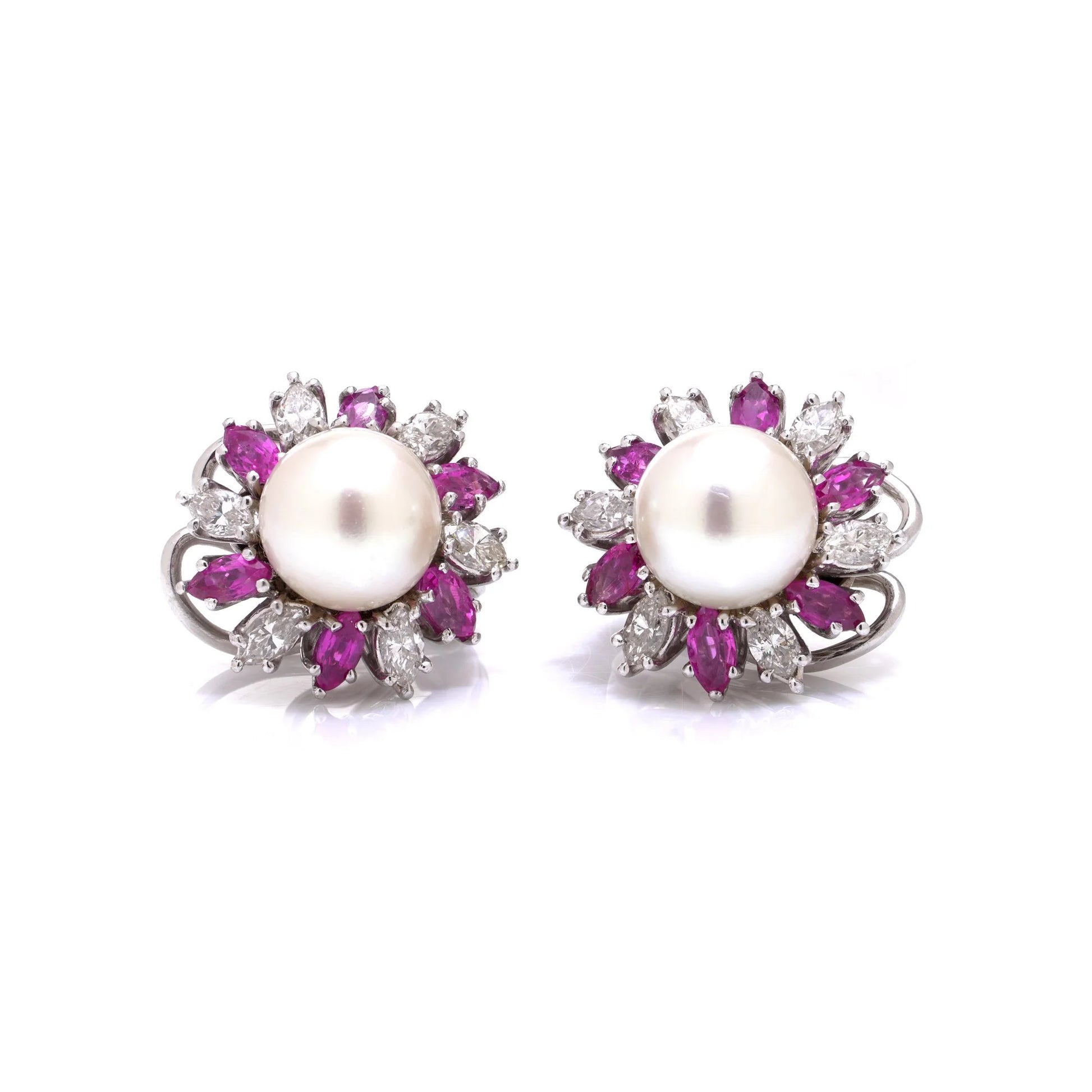 A pair of pearl, pink sapphire and diamond cluster earrings in white gold, on a white background