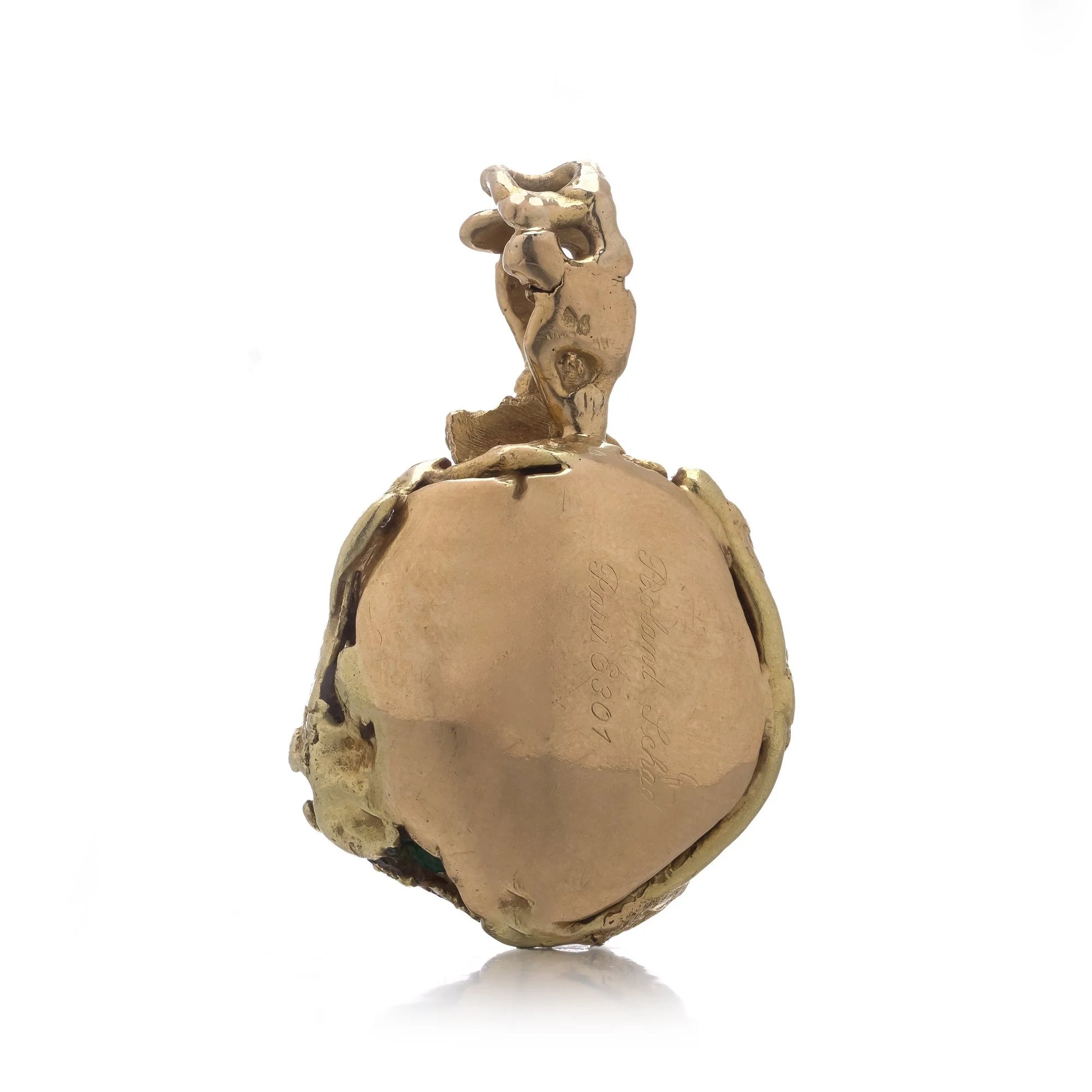 A yellow gold free-form pendant, on a white background