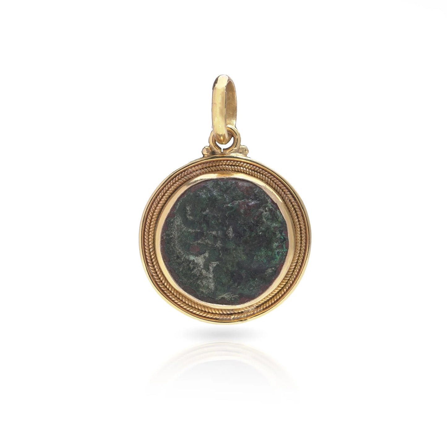 A yellow gold pendant featuring an oxidised ancient Roman coin, on a white background