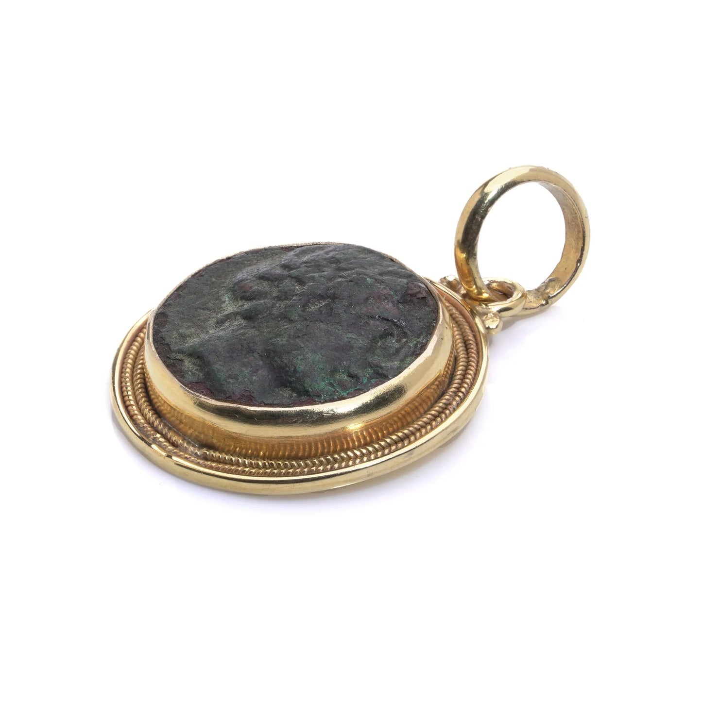 A yellow gold pendant featuring an oxidised ancient Roman coin, on a white background
