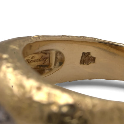 Kutchinsky's maker's mark in a yellow gold ring shank